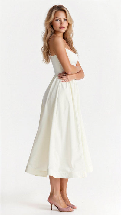 Sophisticated midi dress with thin straps for a refined style