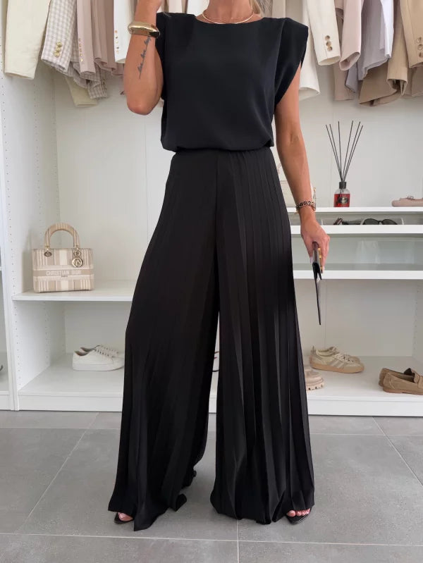 Modern set of sleeveless top and pleated wide-leg pants