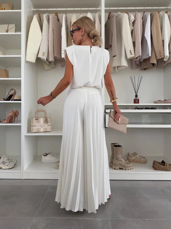 Modern set of sleeveless top and pleated wide-leg pants