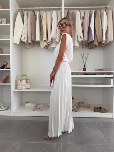 Modern set of sleeveless top and pleated wide-leg pants