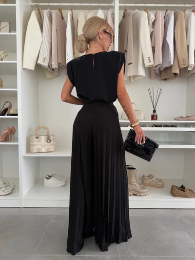 Modern set of sleeveless top and pleated wide-leg pants