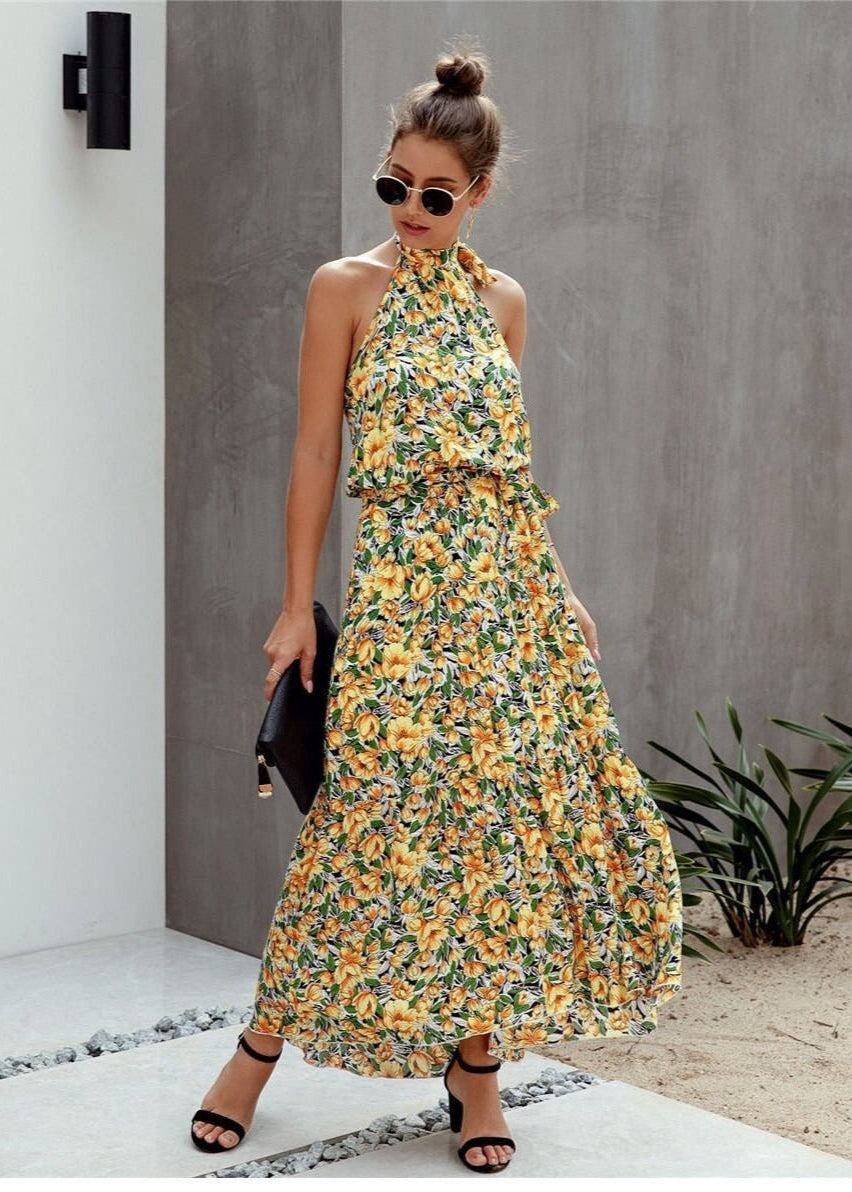 Boho-style long dress with floral print and halter neck