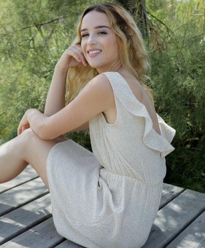 Elegant sleeveless mini dress with a V-neckline at the back