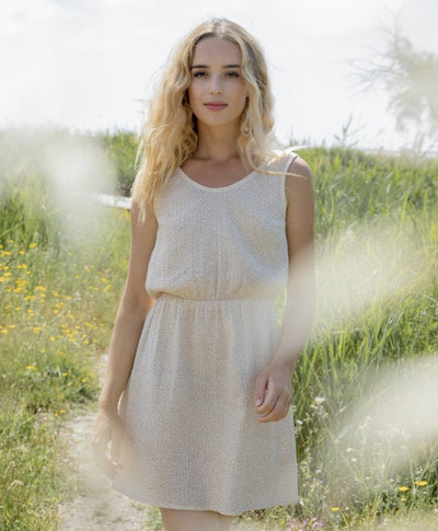 Elegant sleeveless mini dress with a V-neckline at the back