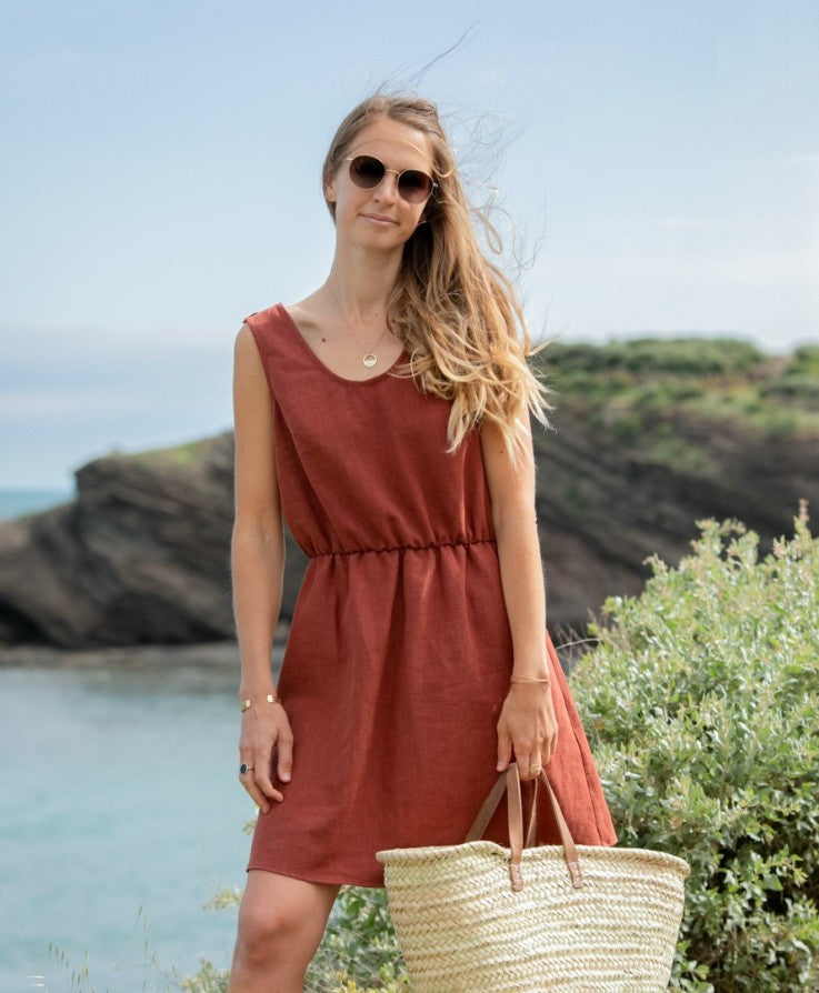 Elegant sleeveless mini dress with a V-neckline at the back