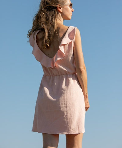 Elegant sleeveless mini dress with a V-neckline at the back