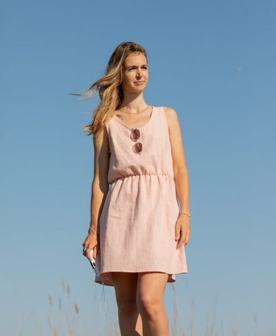 Elegant sleeveless mini dress with a V-neckline at the back