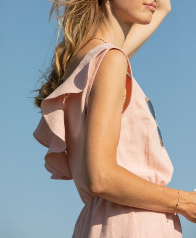 Elegant sleeveless mini dress with a V-neckline at the back