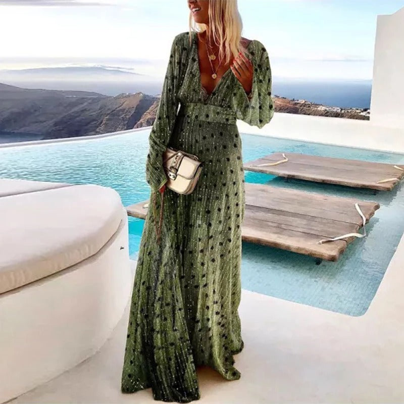 Elegant long dress with polka dot print and flowing style