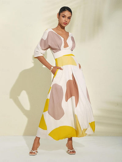 Elegant long summer dress with a cut-out neckline and three-quarter sleeves