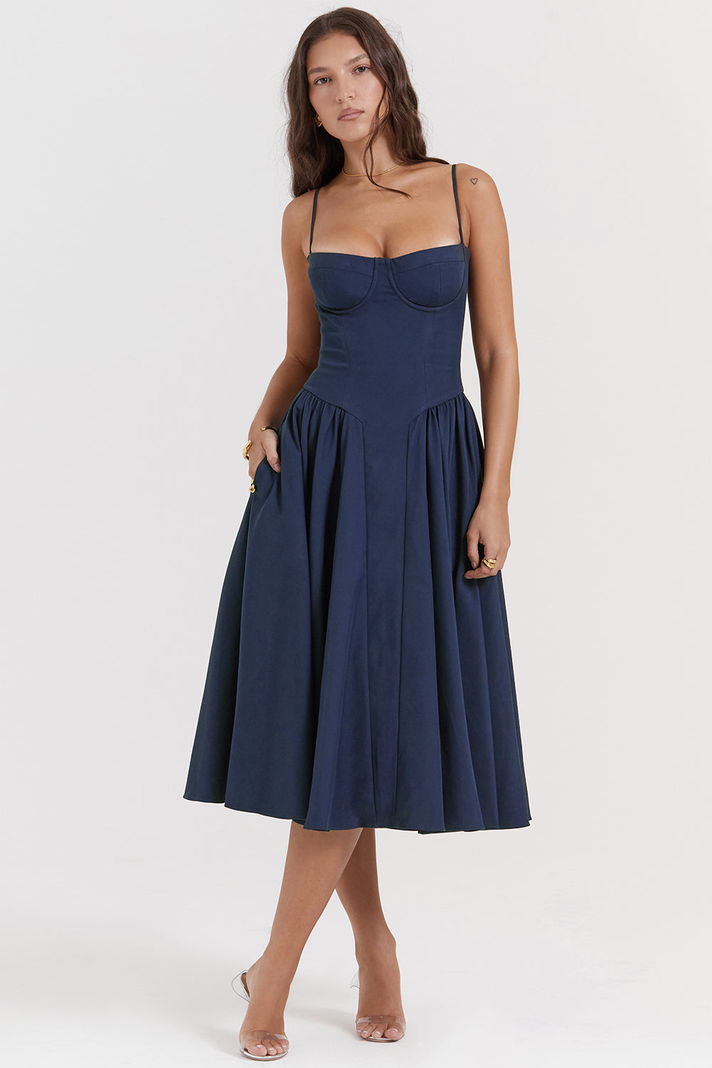 Corset-style midi dress with thin straps and an elegant silhouette