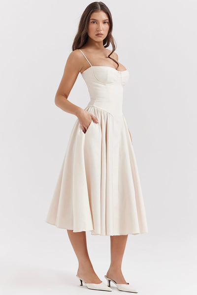 Corset-style midi dress with thin straps and an elegant silhouette