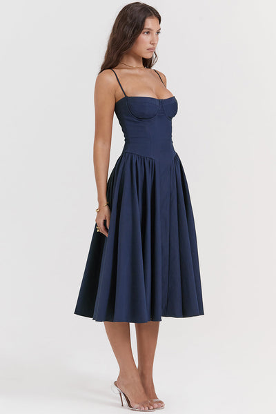 Corset-style midi dress with thin straps and an elegant silhouette