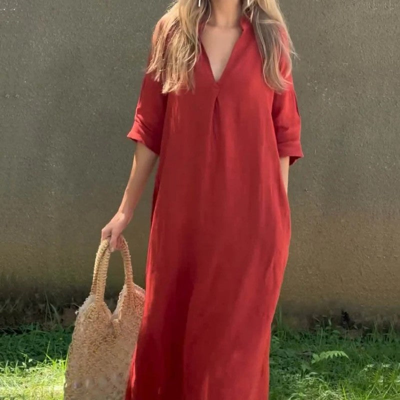 Elegant long dress with a V-neckline and side slit