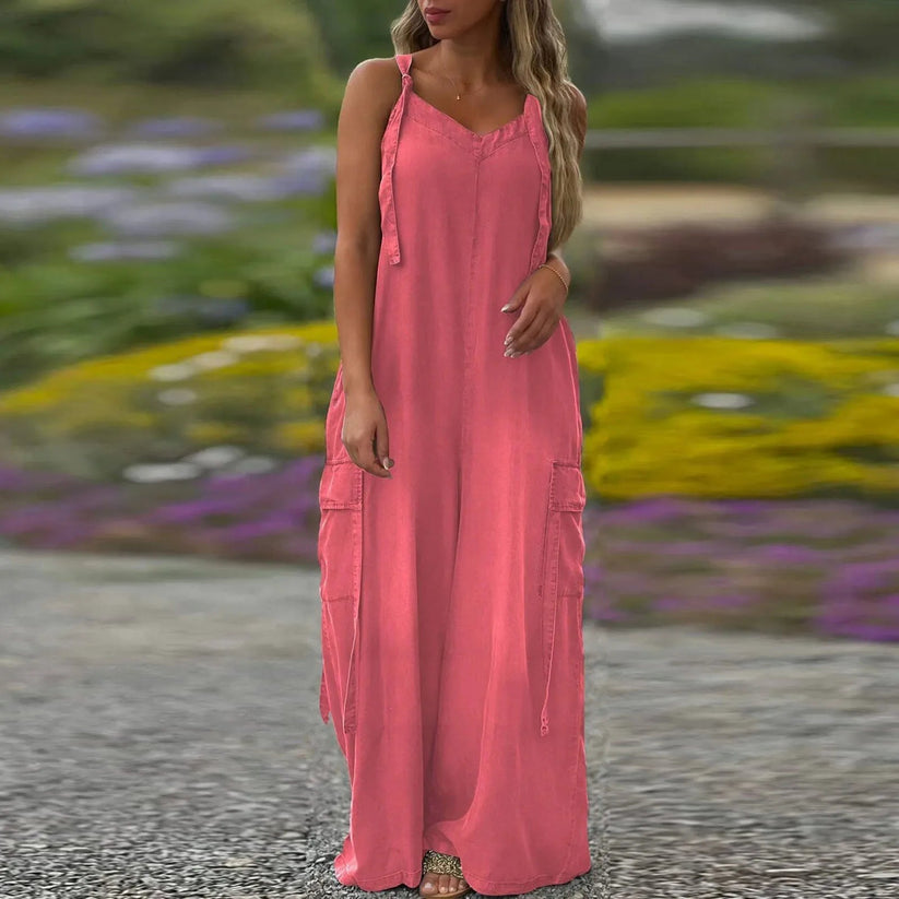 Modern women's jumpsuit with pockets and extra wide leg pants in an elegant style