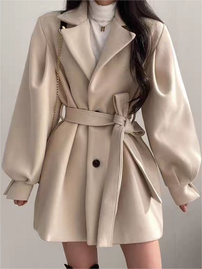 Women's coat with lapel collar, puff sleeves and belt