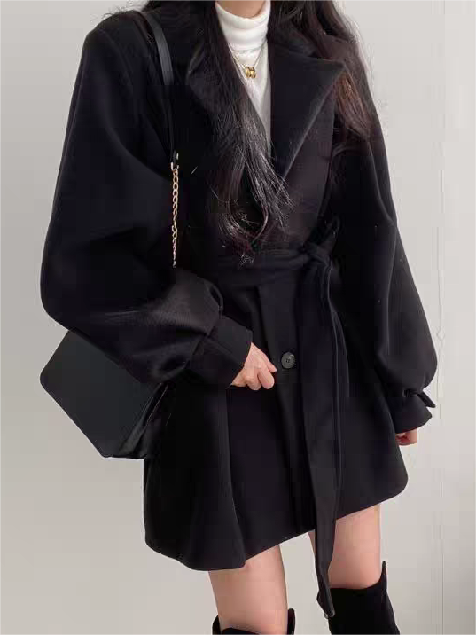 Women's coat with lapel collar, puff sleeves and belt