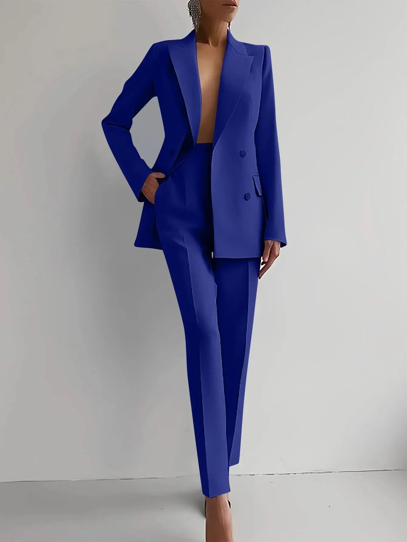 Elegant women's jacket and trousers set for formal occasions