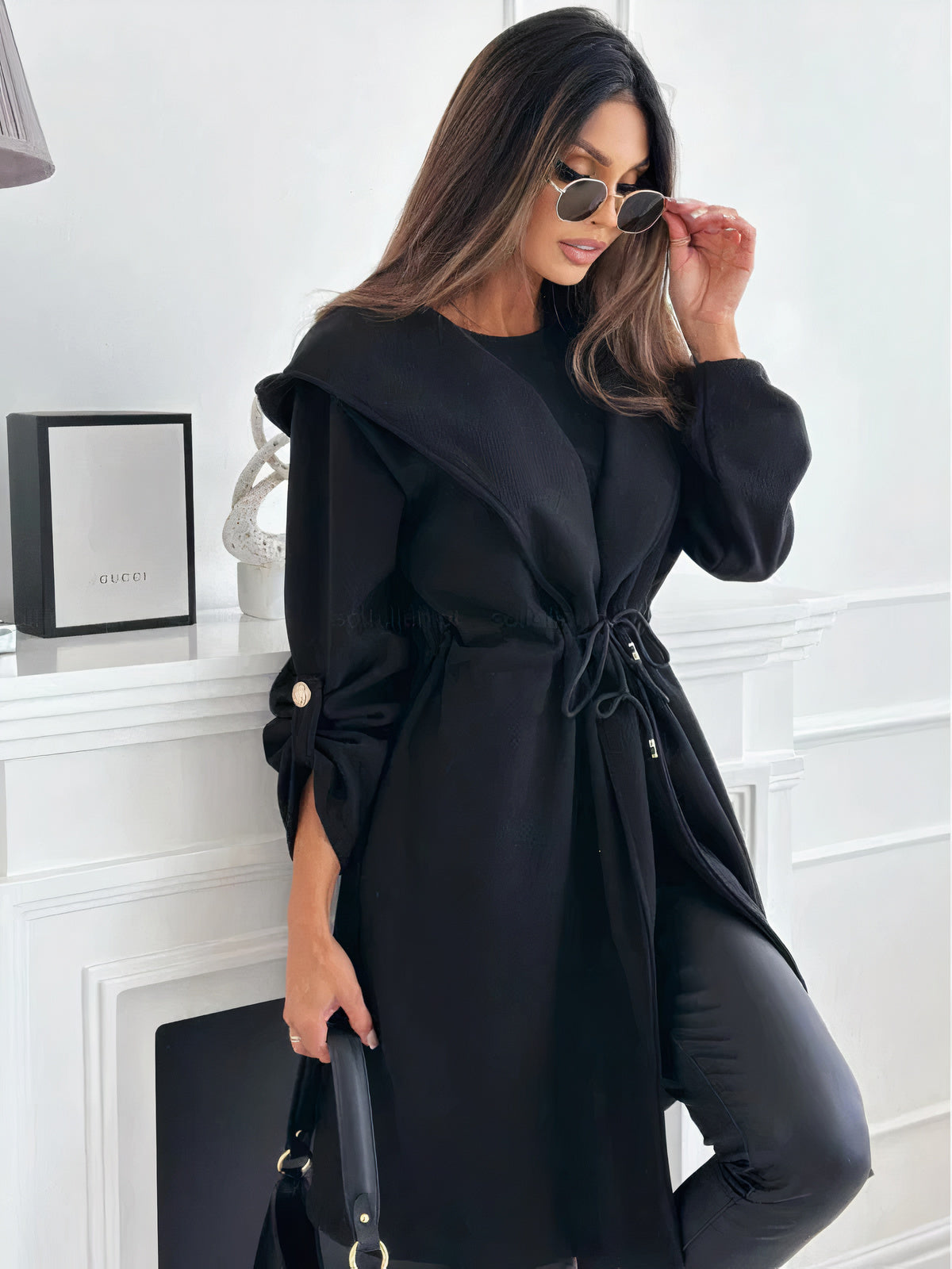 Modern women's cardigan with a wide hood and adjustable belt