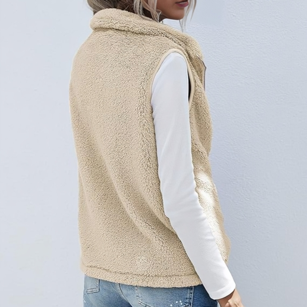 Warm and fashionable women's vest with zipper closure