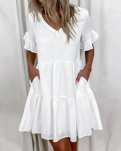 Abigail - Simple casual dress with a V-neck and ruffled hem