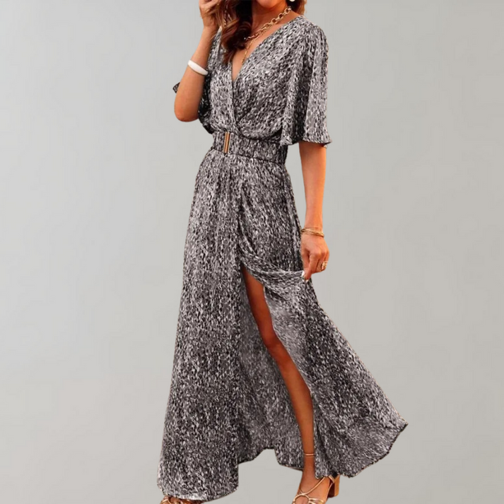 Long flowing dress with a deep neckline and wide sleeves