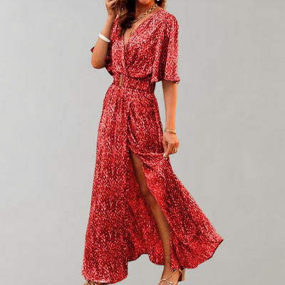 Long flowing dress with a deep neckline and wide sleeves